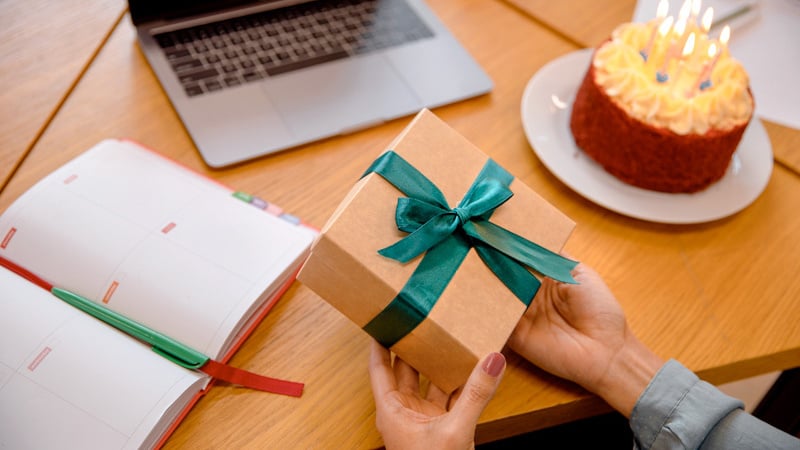 close-up-hand-holding-gift