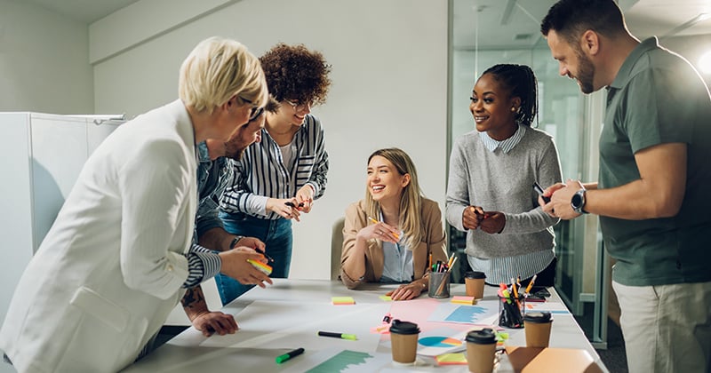 multiracial-business-team-meeting-modern-bright-office