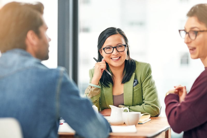 weve-always-been-team-number-one-portrait-young-businesswoman-sitting-meeting-with-her-colleagues